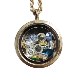 Elegant Goldtone Pendant Necklace with Charms